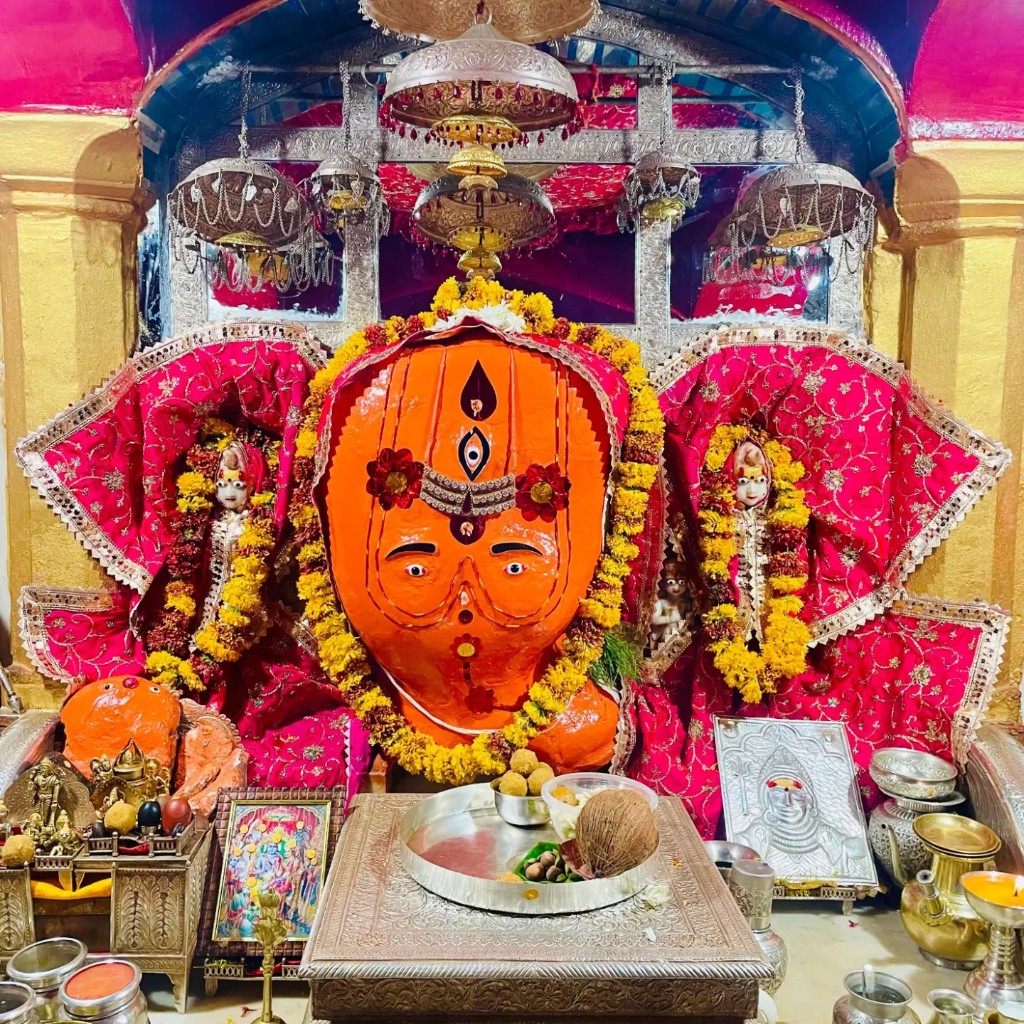 Trinetra Ganesh idol adorned with marigold garlands inside Ranthambore Fort